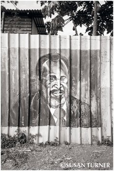 Sir Michael Somare on an Elementary School Fence
